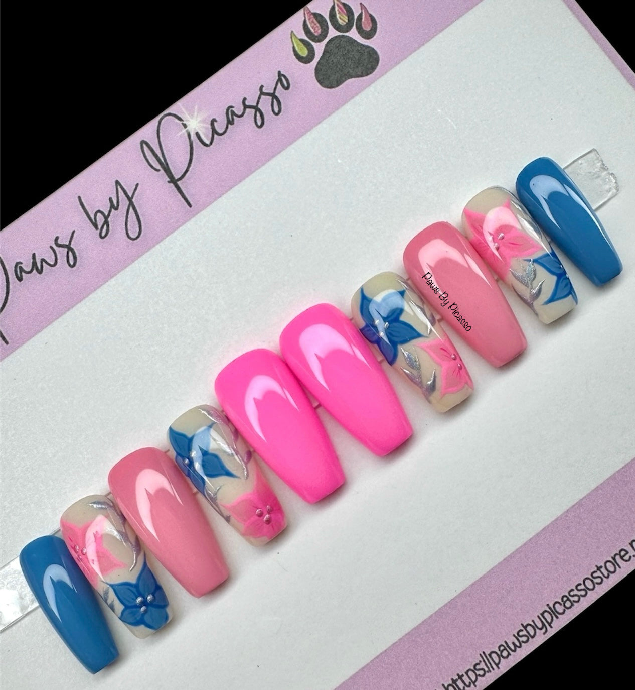 Set of pink and blue nail art on a white background with 'Laws by Picasso' branding.